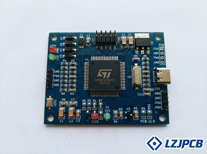 PCB assembly with microcontroller and supporting components